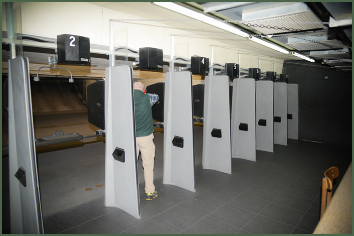 Indoor pistol range shooting lanes Indoor pistol range shooting lanes