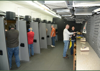 Shooters practicing at the indoor pistol range